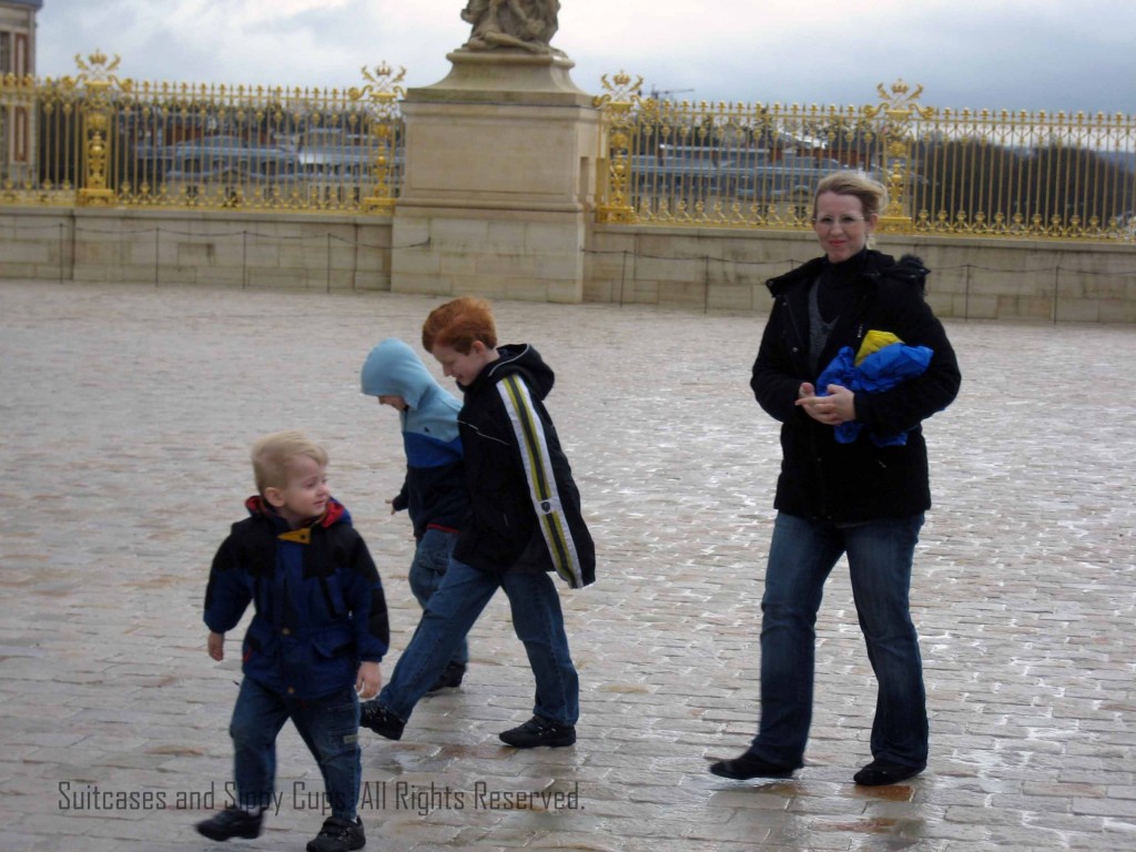 Gates of the Palace of Versailles, wind knocking off feet